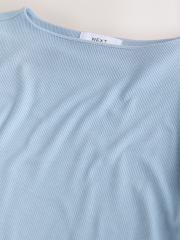 Next Body in Blau