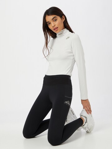 NIKE Skinny Sportbroek 'Epic Luxe' in Zwart