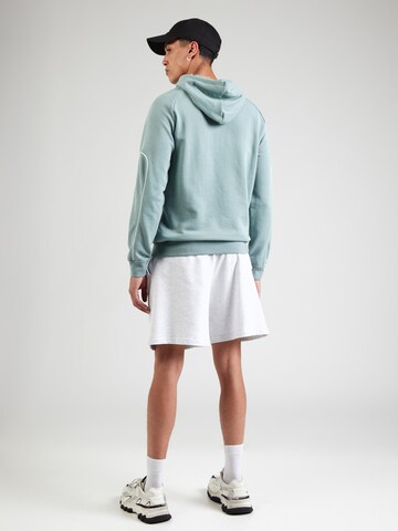 PUMA Sportsweatshirt in Grün