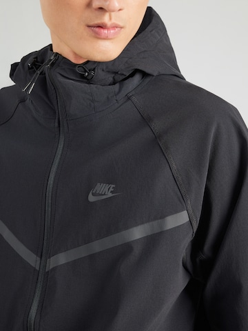 Nike Sportswear Λειτουργικό μπουφάν 'TCH' σε μαύρο