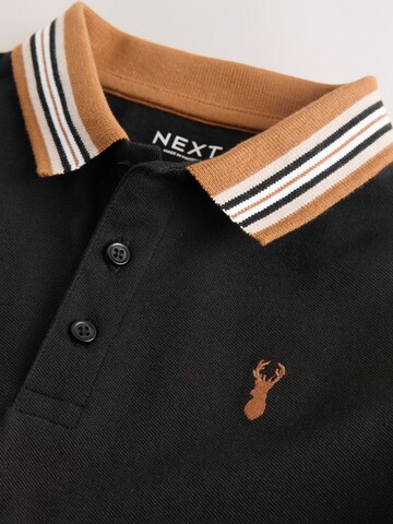 Next T-shirt i svart