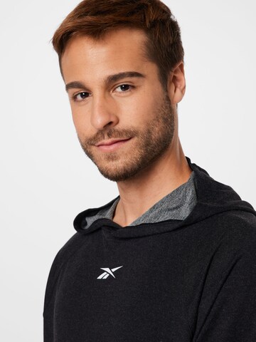 Reebok Sport sweatshirt i svart