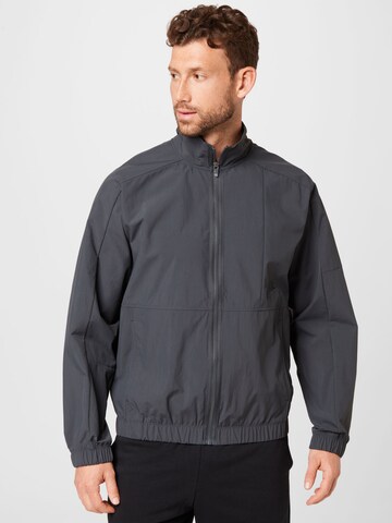 Nike Sportswear Between-season jacket in Grey: front