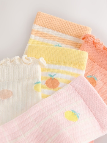 Next Sockor i orange
