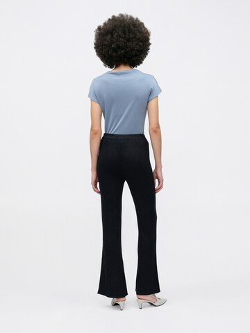 Calvin Klein Jeans Flared Trousers in Blue: back