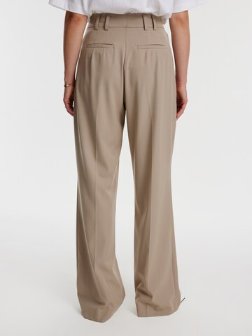 Loosefit Pantaloni 'Berte' di EDITED in beige