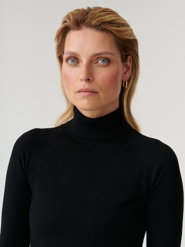 TATUUM Sweter 'NEKOKI' w kolorze czarny
