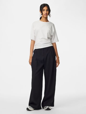 PIECES Wide Leg Bukser med lægfolder 'PCCARLA' i sort: forside