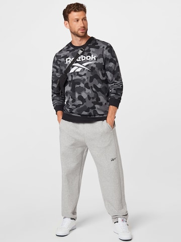 ReebokSportska sweater majica - crna boja