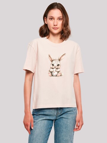 T-shirt 'Niedlicher Osterhase mit Ei' F4NT4STIC en rose : devant