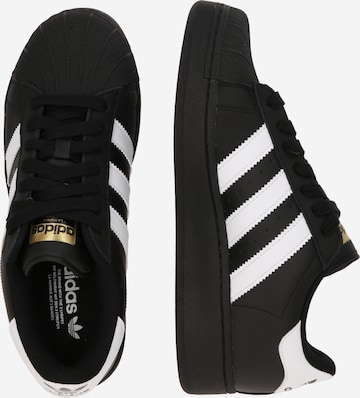 ADIDAS ORIGINALS Σνίκερ χαμηλό 'Superstar Xlg' σε μαύρο