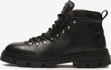 Kazar Lace-Up Boots in Black: front