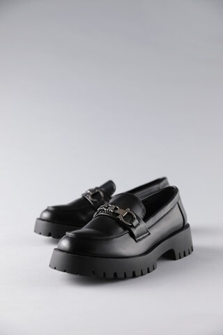 Aniston Slipper in Schwarz