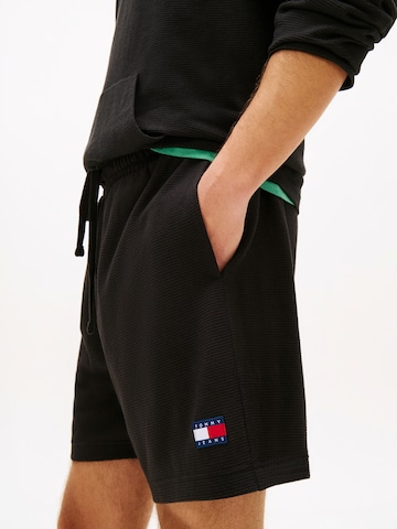 Tommy Jeans Regular Housut värissä musta