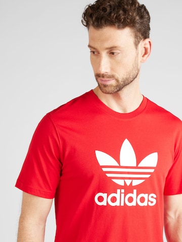 ADIDAS ORIGINALS Μπλουζάκι 'Adicolor Trefoil' σε κόκκινο