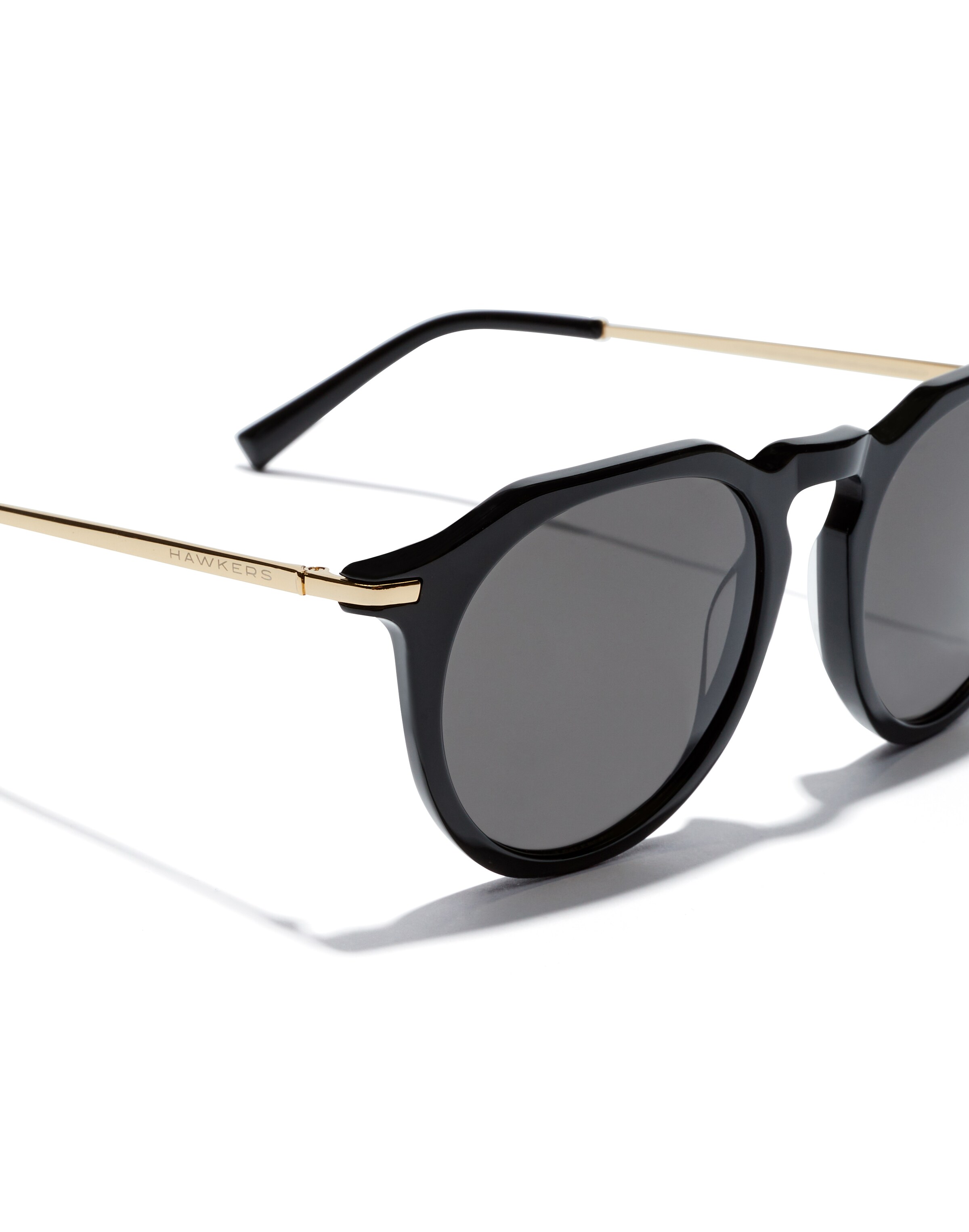 melns HAWKERS Saulesbrilles