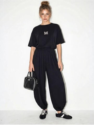 Completo pantalone di Bianco Lucci in nero: frontale