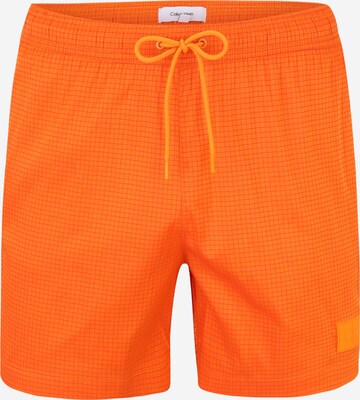 Calvin Klein Swimwear Board Shorts in Orange: front