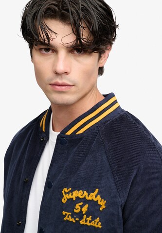 Superdry & Co Between-season jacket 'VARSITY' in Blue