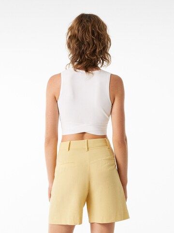 Bershka Regular Trousers in Yellow