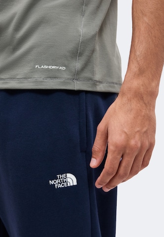 THE NORTH FACE Tapered Παντελόνι 'EVOLUTION SIMPLE DOME' σε μπλε