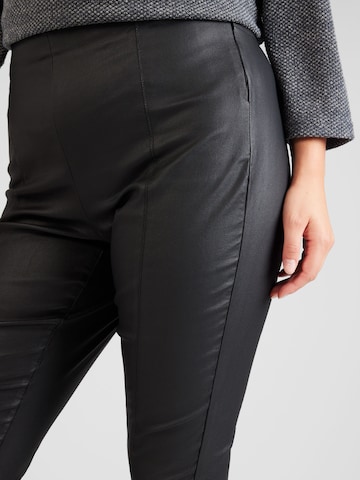 Skinny Pantaloni 'IZABEL' di ONLY Curve in nero