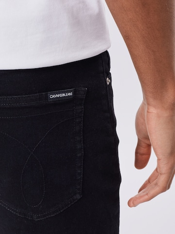 Calvin Klein Jeans - Slimfit Calças de ganga 'CKJ 058 SLIM TAPER' em preto