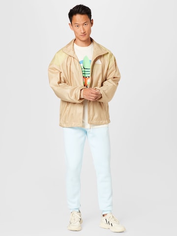 ADIDAS SPORTSWEAR Sportjacke 'Traveer' in Beige