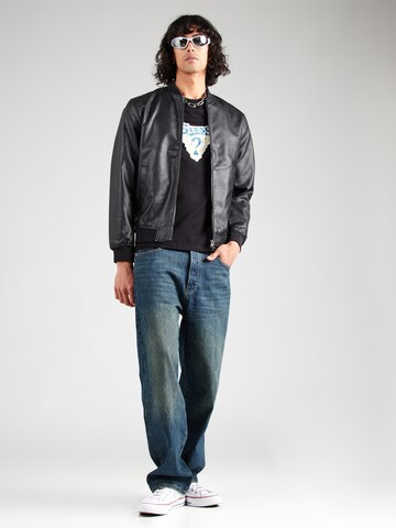 GUESS T-Shirt in Schwarz