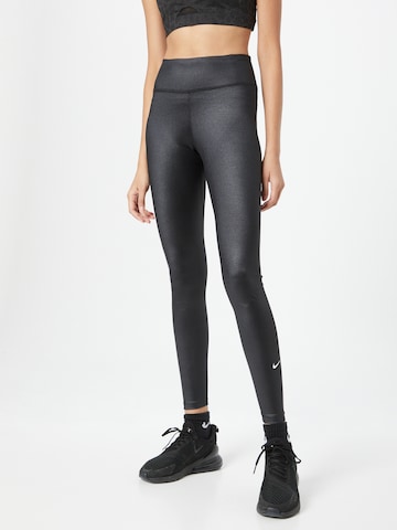 NIKE Skinny Workout Pants in Black: front