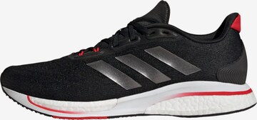 Chaussure de course 'Supernova' ADIDAS SPORTSWEAR en noir : devant