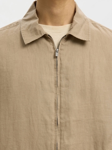 SELECTED Tussenjas in Bruin