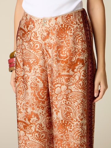 oltre Baggy Trousers in Orange