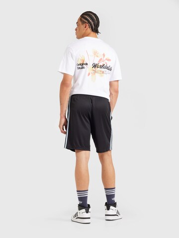 ADIDAS PERFORMANCE - Loosefit Pantalón deportivo en negro