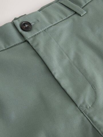 Slimfit Pantaloni chino di Next in verde