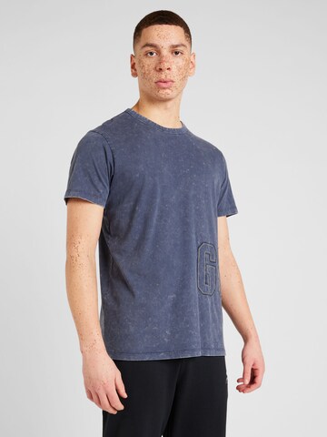 T-Shirt GUESS en bleu : devant