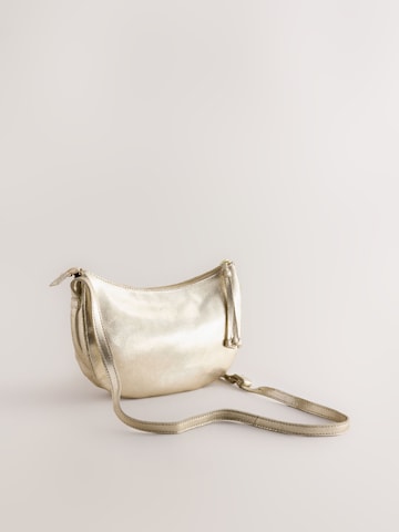 Next Crossbody bag in Gold