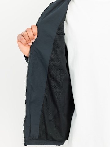 ALPHA INDUSTRIES Between-Season Jacket 'Ptg' in Black: front