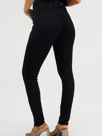 Skinny Jeans di WE Fashion in nero