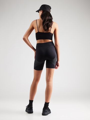 UNDER ARMOUR Skinny Športové nohavice 'Vanish' - Čierna