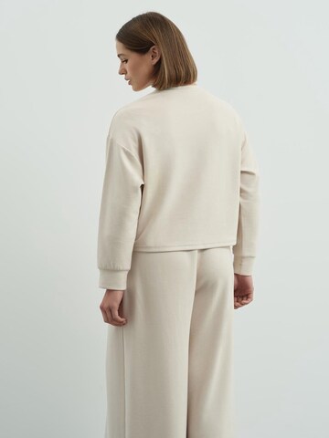 C&City Wide leg Pleat-front trousers in Beige