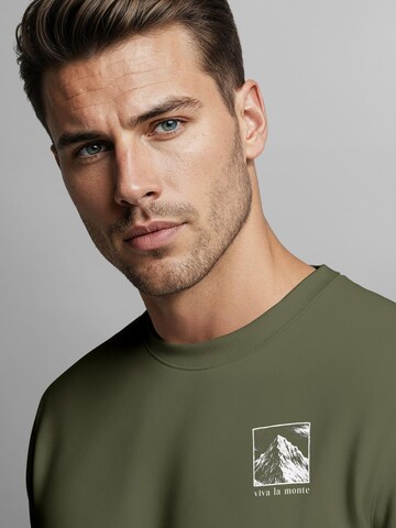Neverless Sweatshirt 'viva la monte' in Green