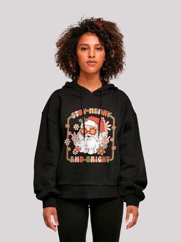 F4NT4STIC Sweatshirt 'Stay Merry And Bright Hippie Santa' in Schwarz: Vorderseite
