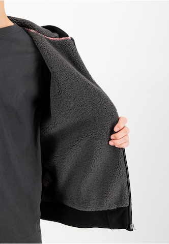 Veste de survêtement ALPHA INDUSTRIES en noir