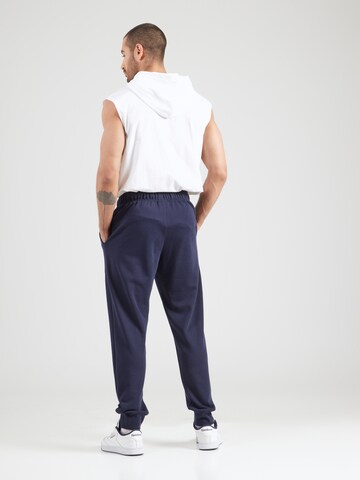 Champion Authentic Athletic Apparel - Tapered Pantalón en azul