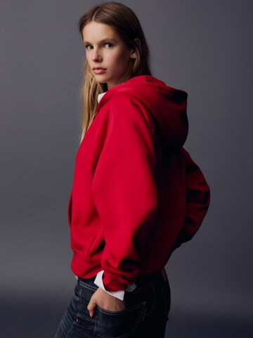 Bershka Sweat jacket in Red: side