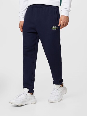 Tapered Pantaloni di LACOSTE in blu: frontale