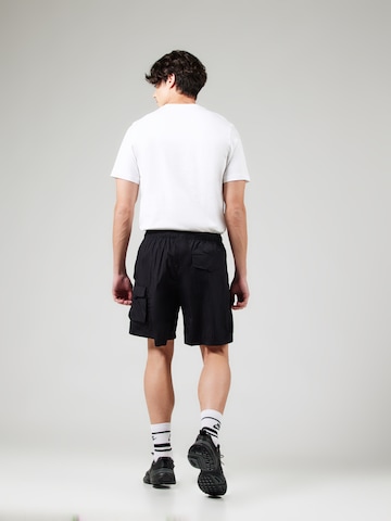 Loosefit Pantalon cargo Nike Sportswear en noir