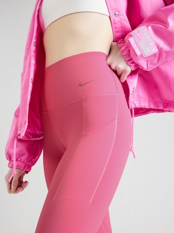NIKESkinny Sportske hlače 'UNIVERSA' - roza boja