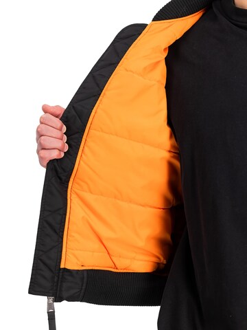 ALPHA INDUSTRIES Between-Season Jacket 'MA-1 Teddy' in Black